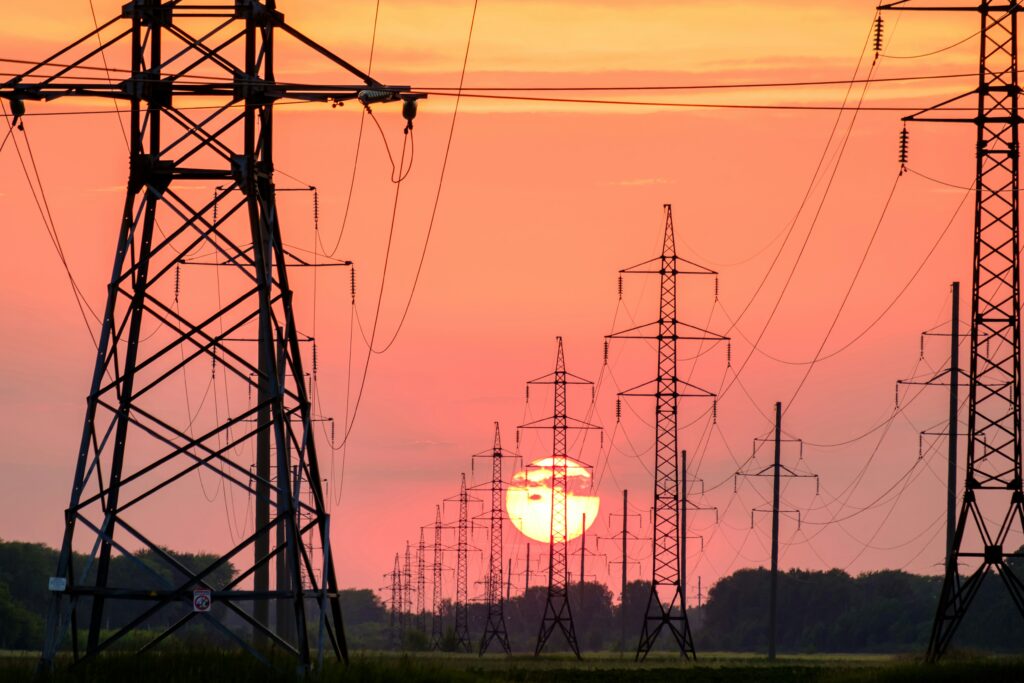 Power Lines against an orange sky